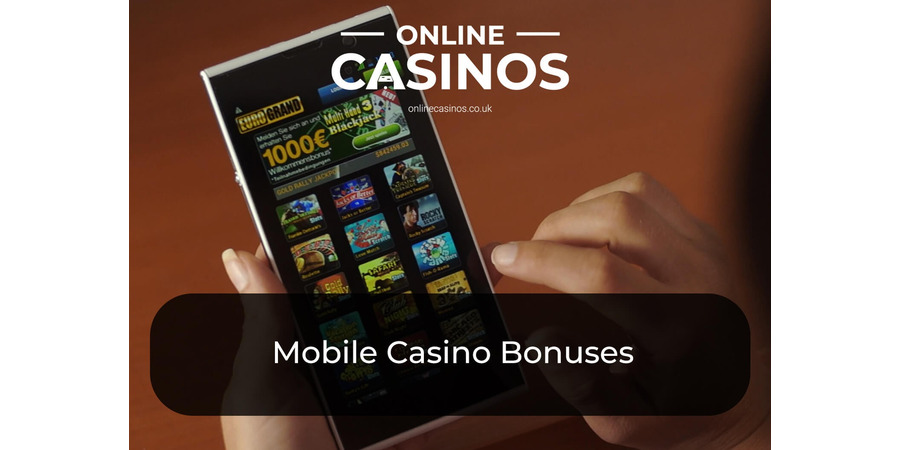 A person holds a smartphone that displays slot games that feature mobile casino bonuses