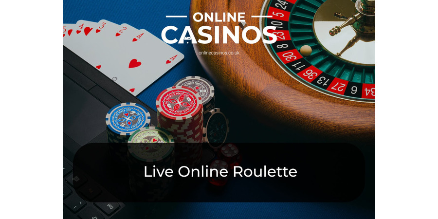 A roulette wheel with a white ball resting in the red 30 ball section, with playing cards, chips and a laptop keyboard nearby represents what goes into playing live online roulette games 