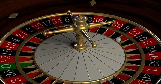 A roulette wheel with the white ball resting in the red 23 section is something you might see at the best online casinos